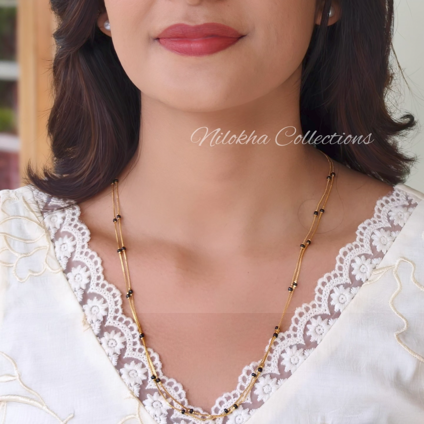 Gold look-alike 3 layer long chain with black beads | NAN317B