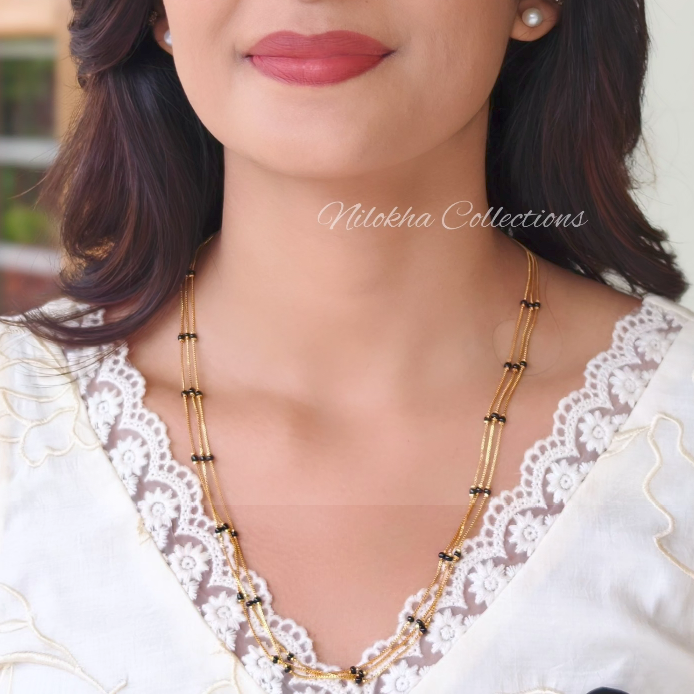 Gold look-alike 3 layer long chain with black beads | NAN317C