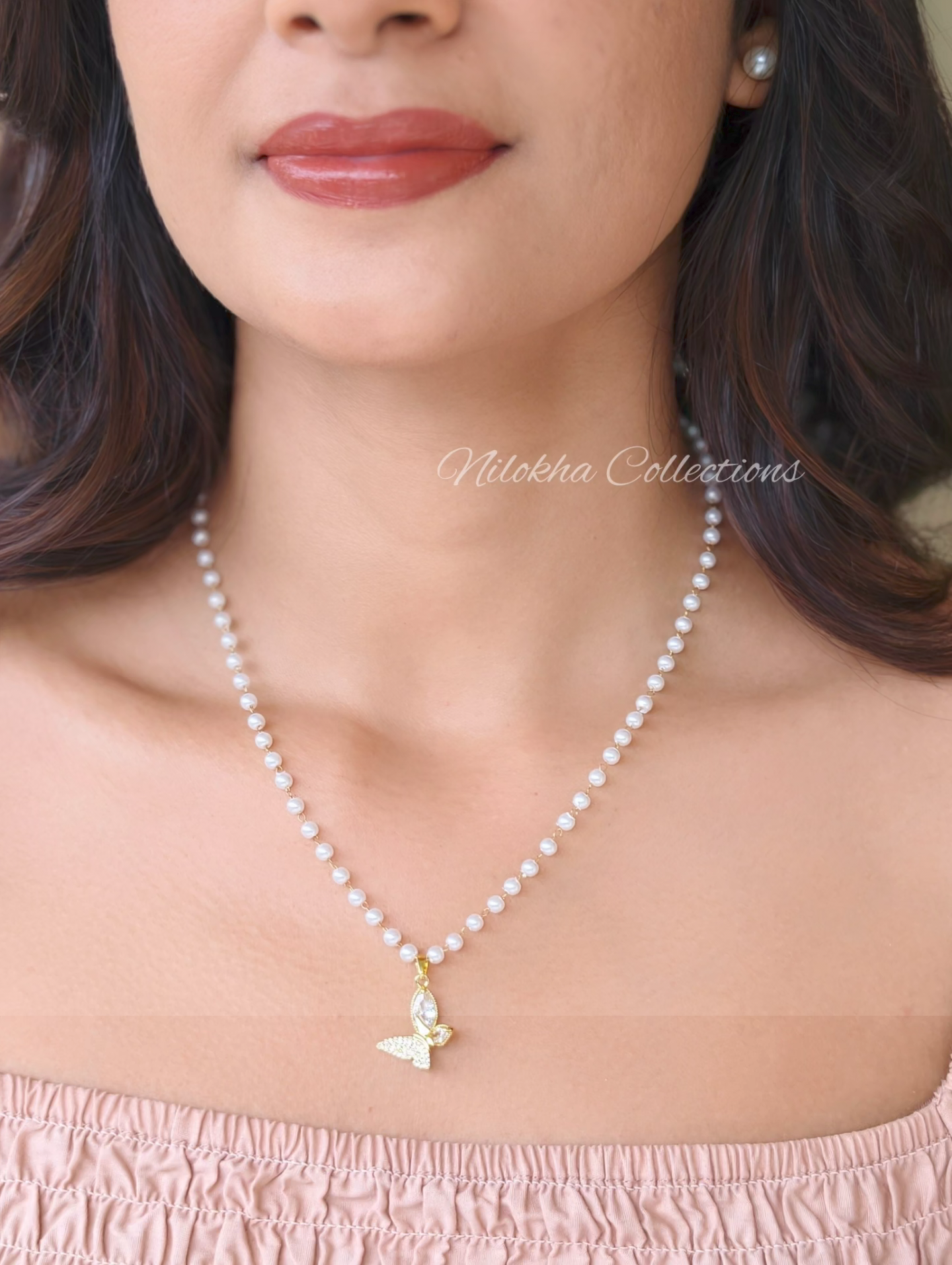 Pearl neckpiece with butterfly stone pendant | NTN54A