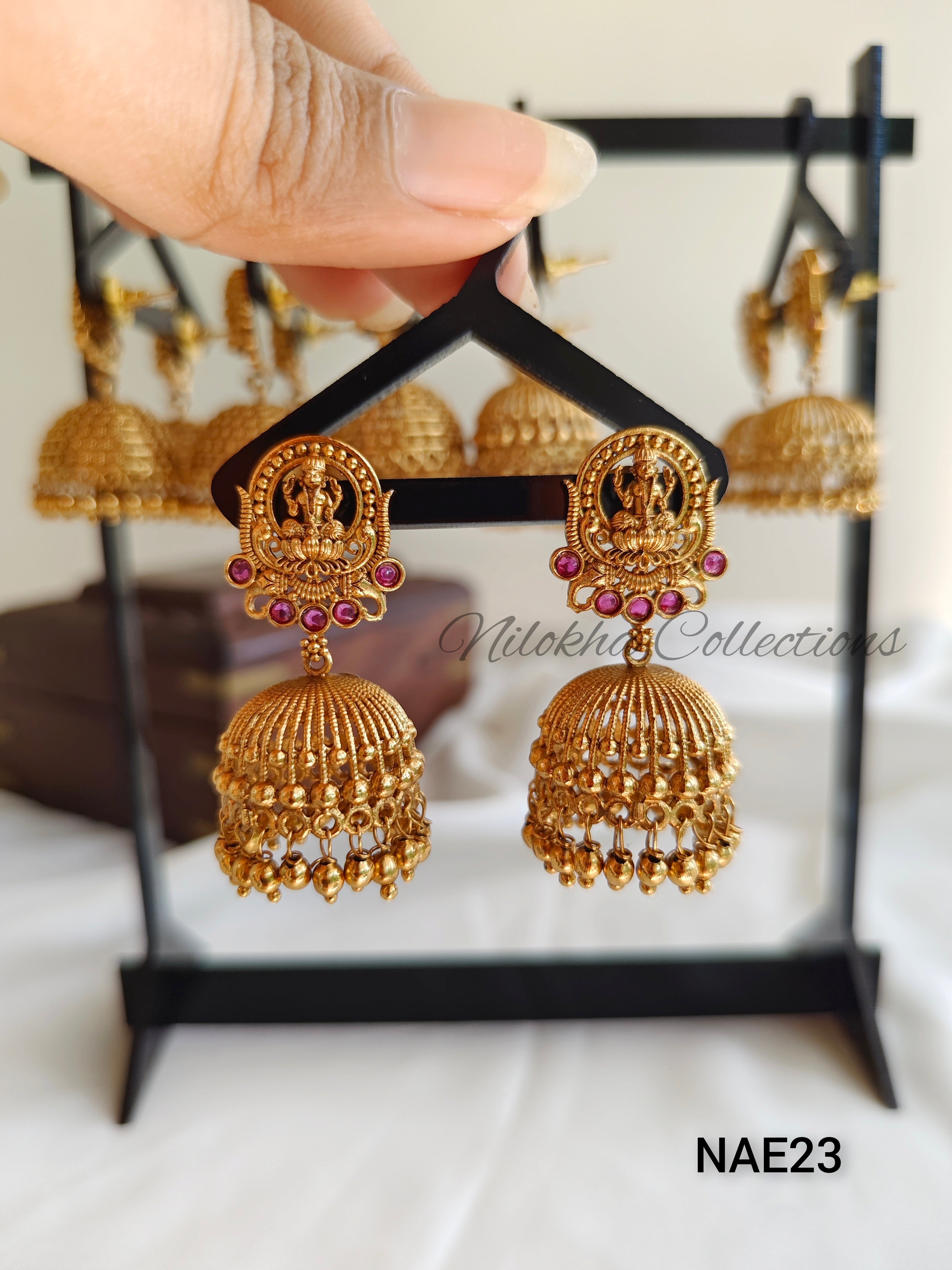 Line patterned jhumkas |  NAE23
