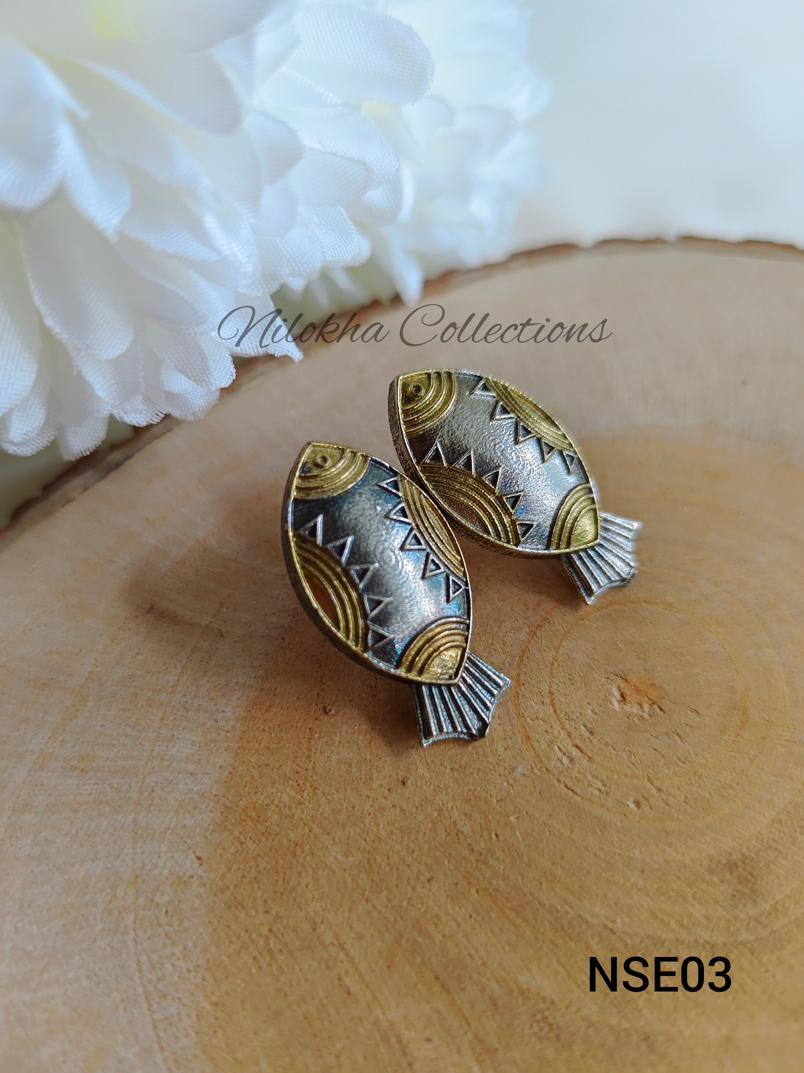 Dual fish studs | NSE03