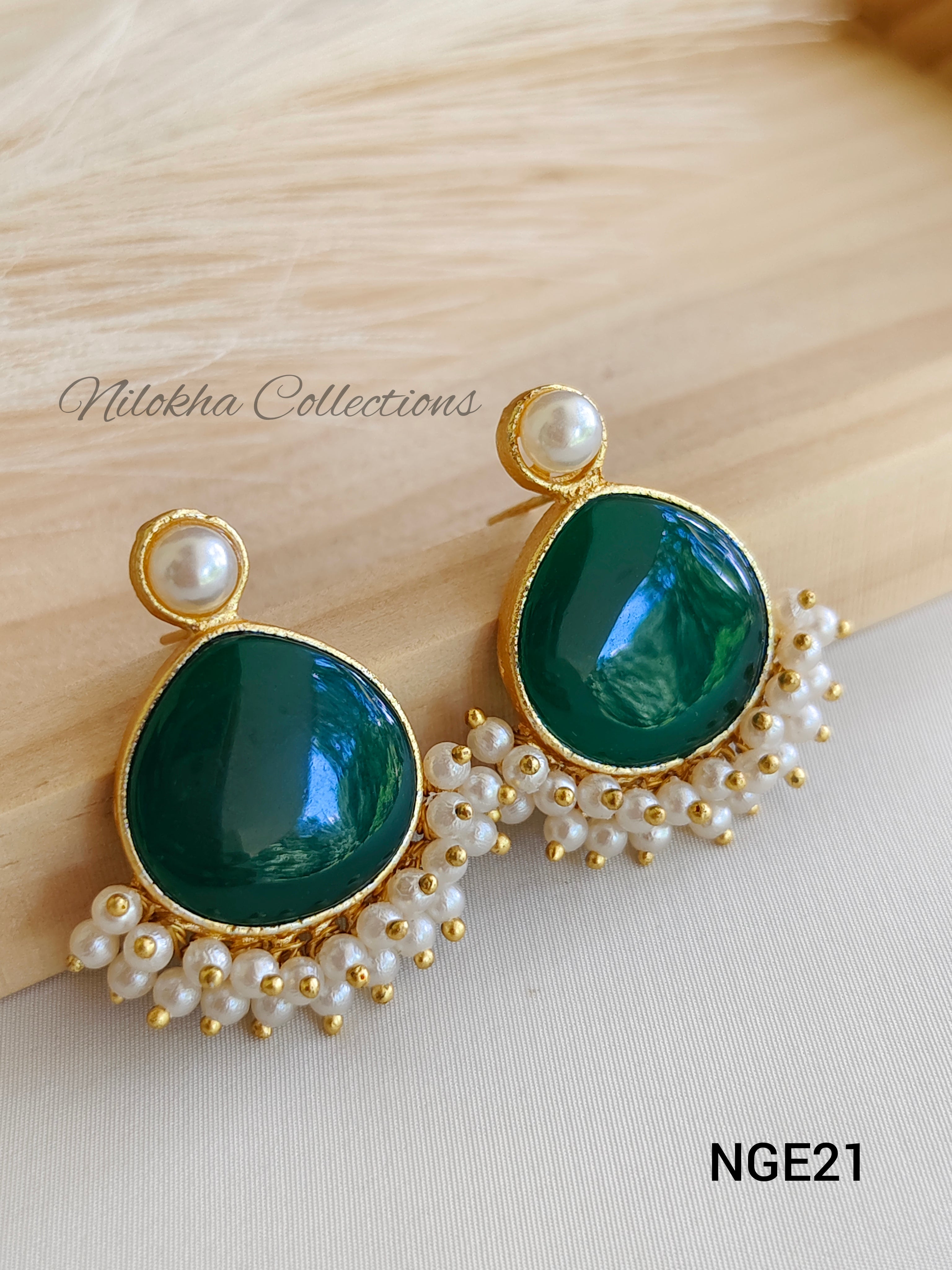 Stone earrings with ghungroo pearls | NGE21