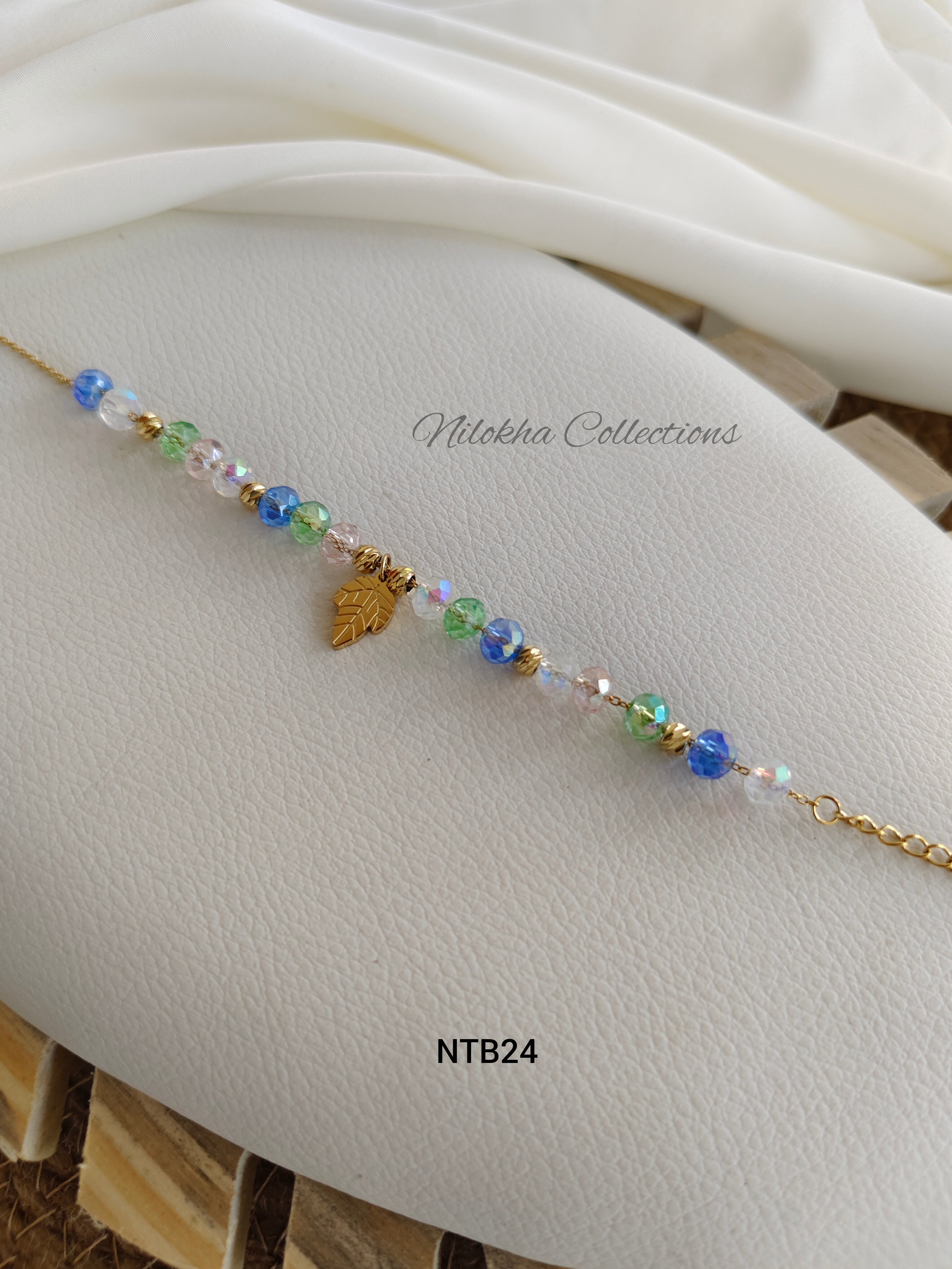 Crystal bracelet with leaf charms | NTB24